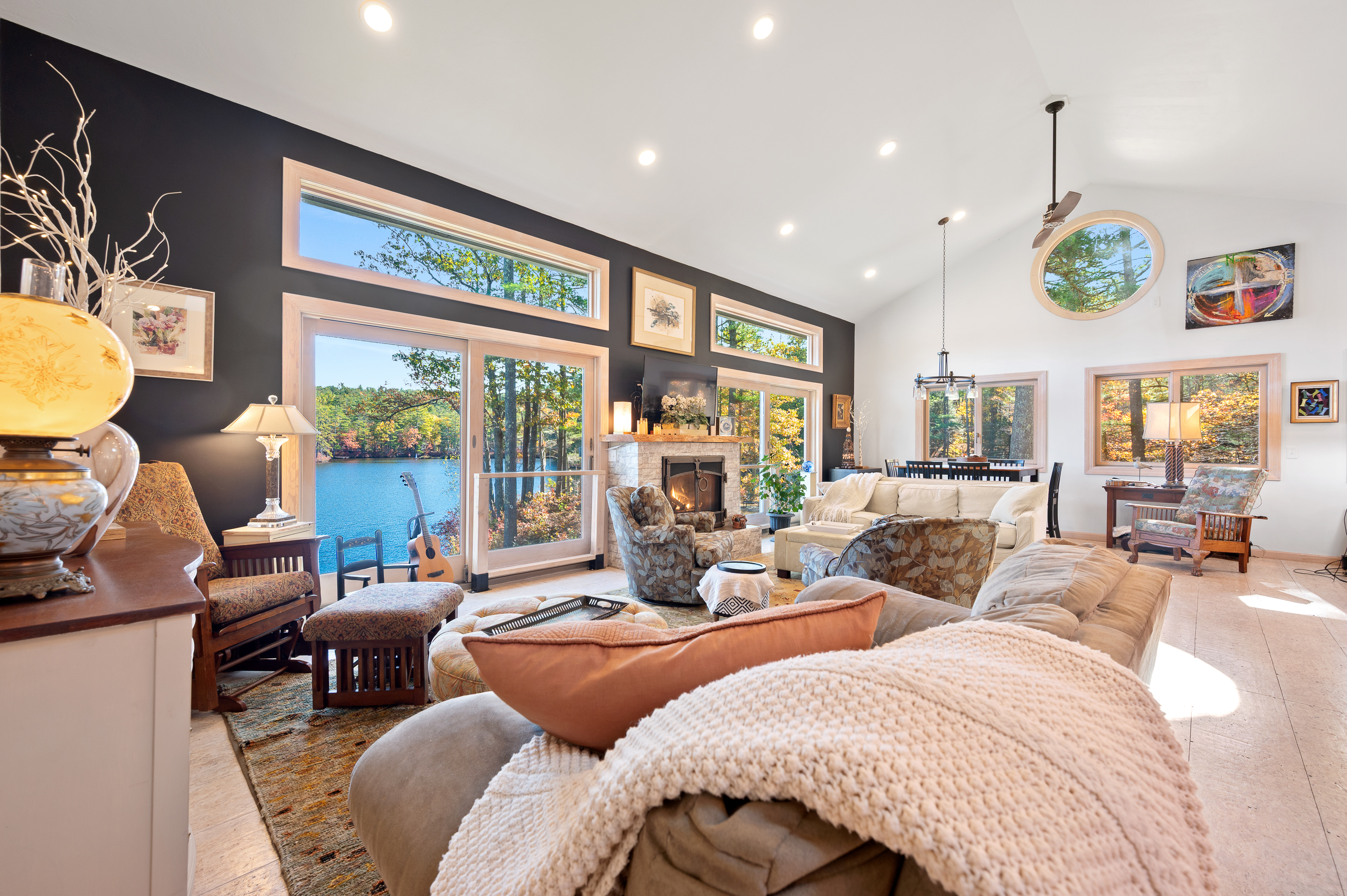 Cozy living room with large windows and ocean views.