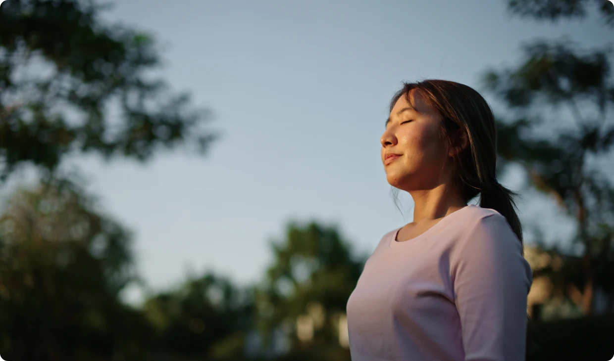 Relaxed woman basking in sun